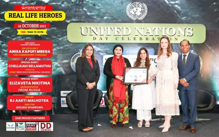 Jyoti Bawa receiving recognition during a United Nations Day celebration in 2023